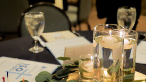 Close up view of business meeting center pieces- candles floating on water