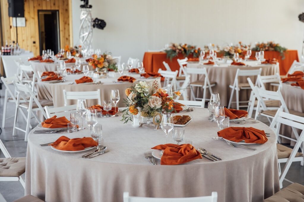 Fall Wedding Color Palettes That Work Beautifully at The Embassy 2 burnt orange and cream table settings