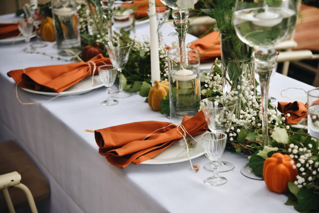 Fall Wedding Color Palettes That Work Beautifully at The Embassy 3 fall wedding table placement with greenery